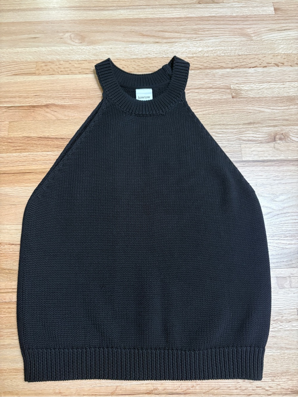 Singlet with a halter neck line by Kowtow Clothing. Size Medium. Never worn.
